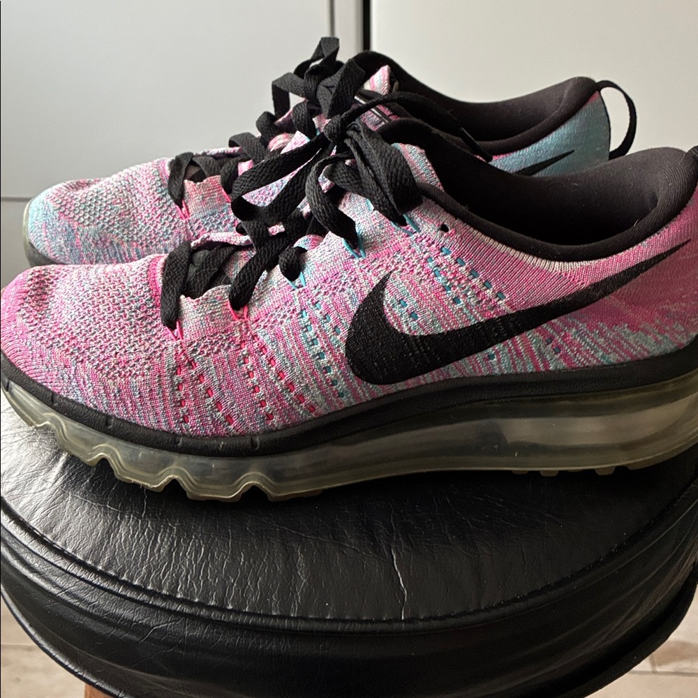 Running Nike Pink and Blue Sneakers Spring into Nike